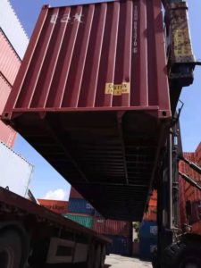 transporting a container to a factory from China